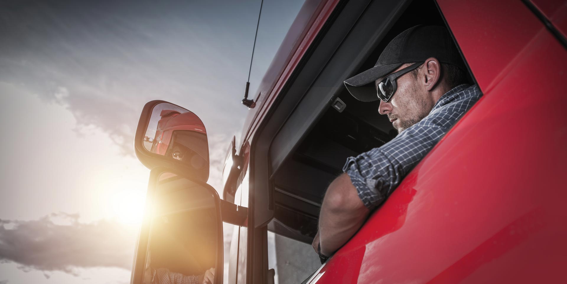 Driver in truck banner image